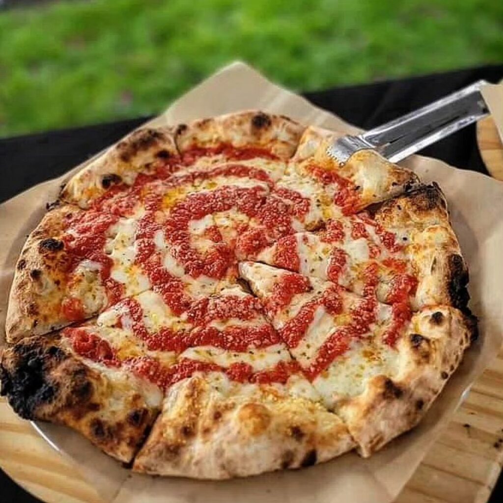 Mezzaluna Wood Fire Pizza Trading in Wheels for New Brick and Mortar